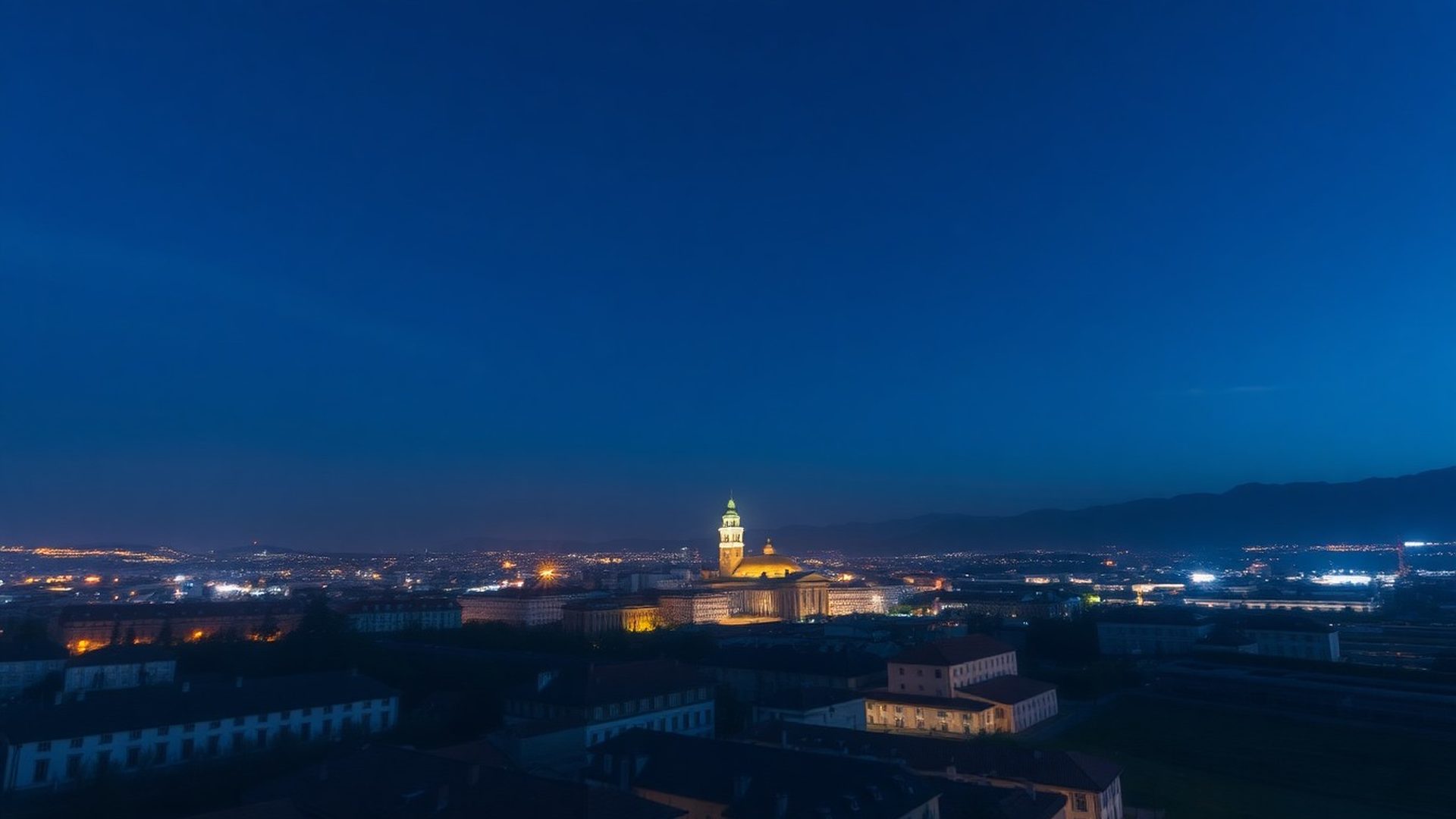 Alpska svetloba nad Ljubljano v mraku, editorial motiv zaščite kapitala